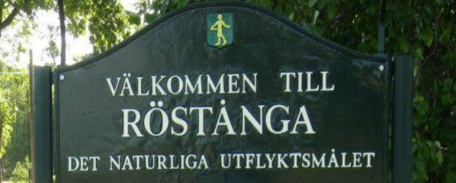 skylt med välkomstskylt